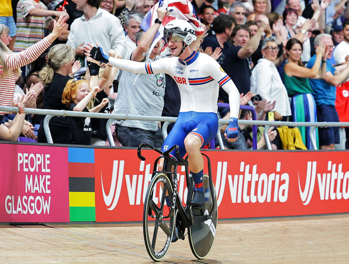 Will Tidball celebrates after winning the 2023 scratch race at the World Track Championships.